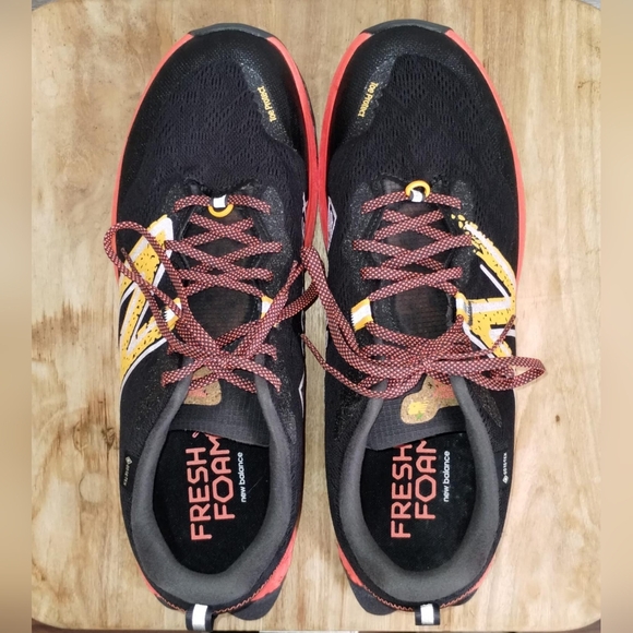 New Balance Black and Orange Athletic Shoes - Picture 3 of 6